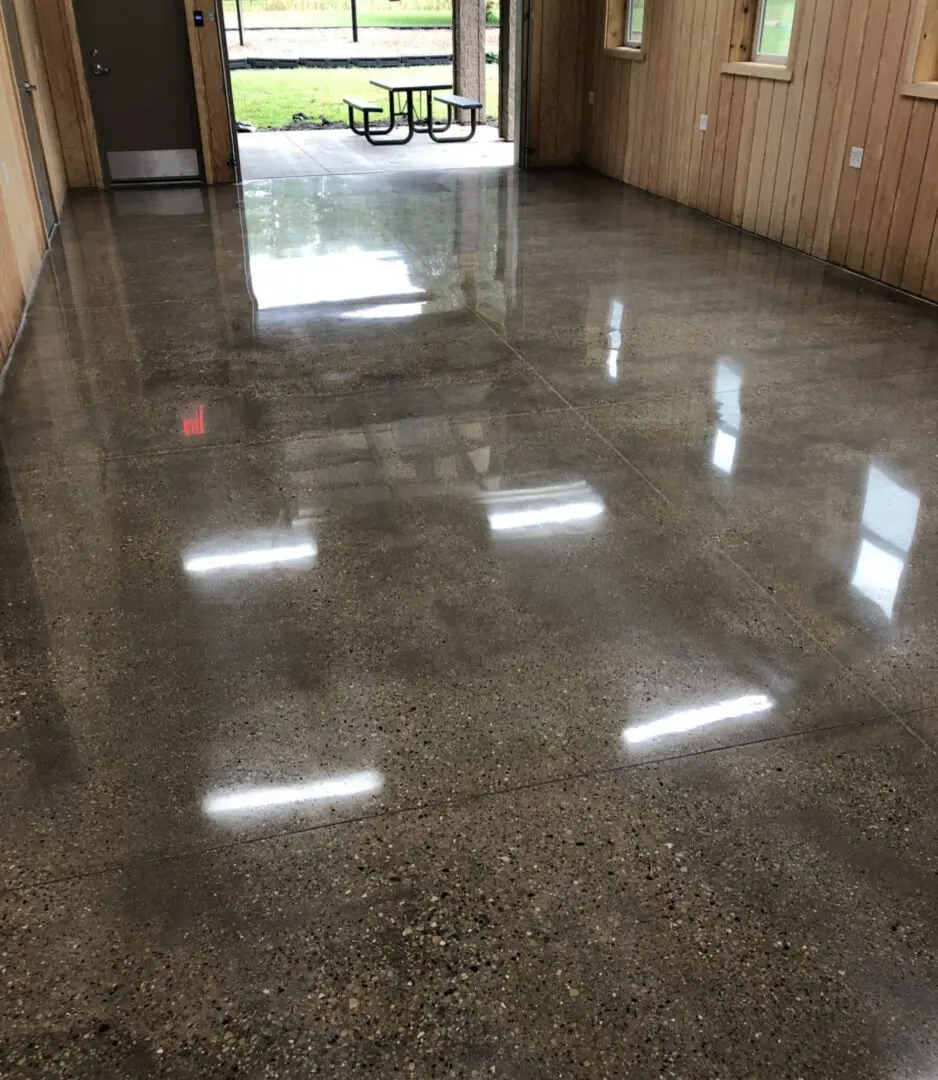 A room with a floor that has been polished.